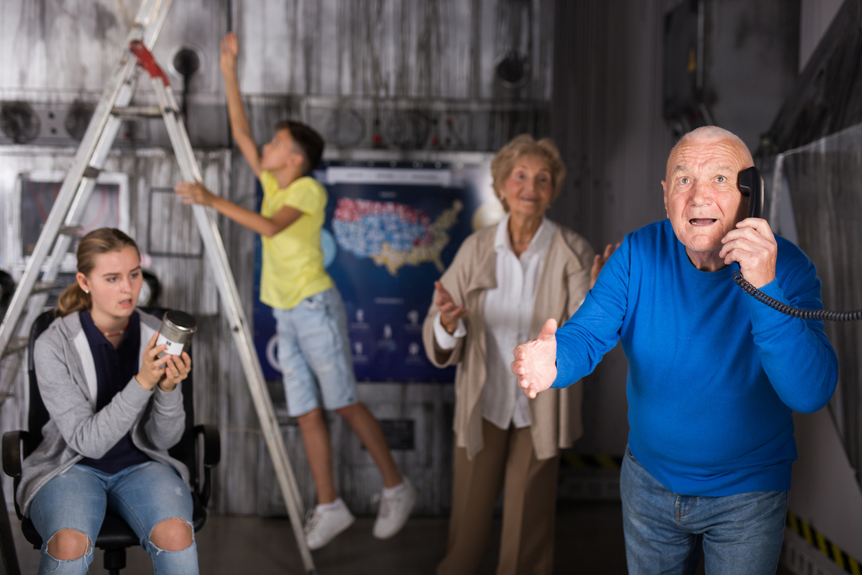 Grandparents and grandchildren enjoying friendly-friendly activities like escape rooms in Central Illinois